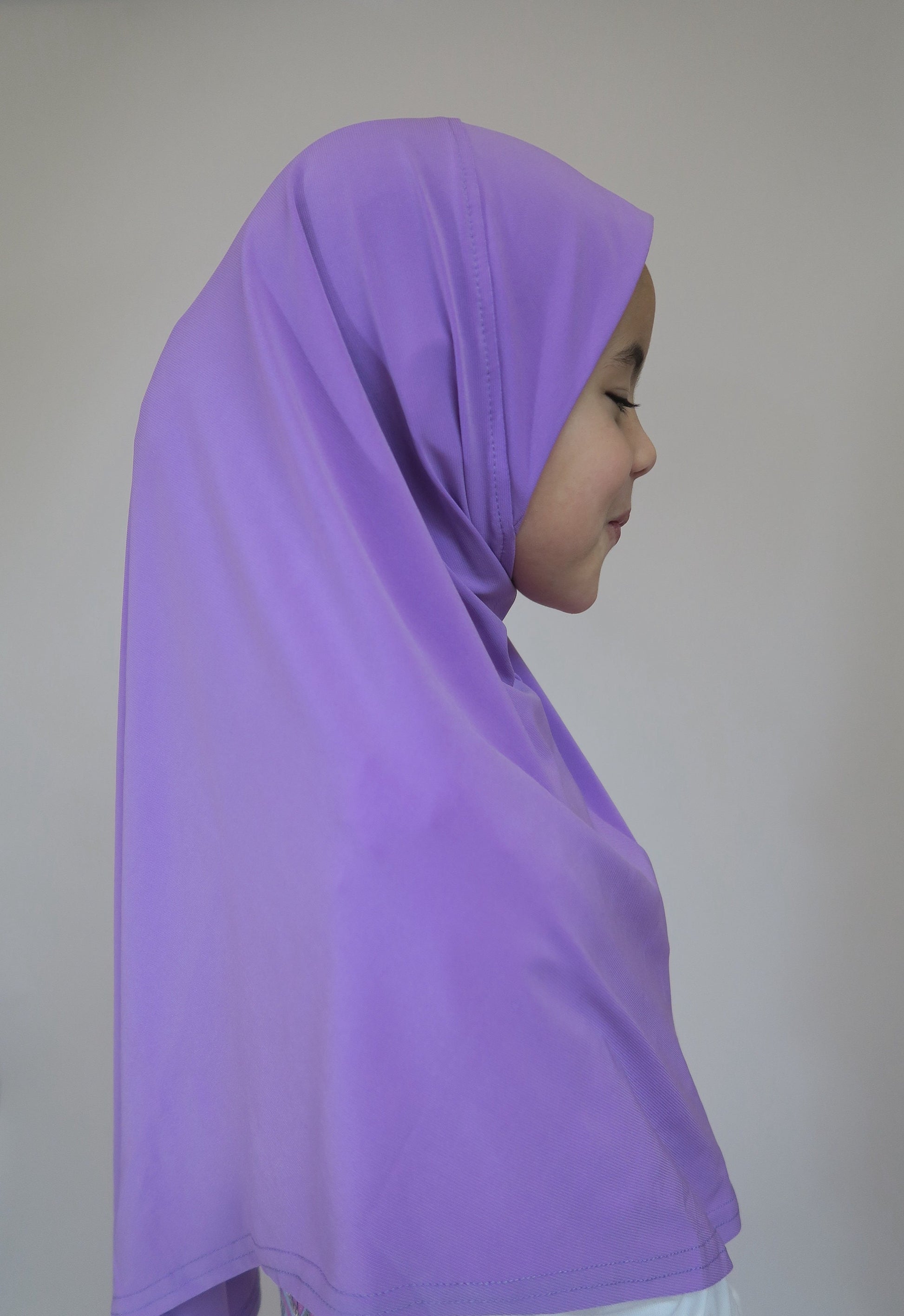 side of purple one piece hijab
