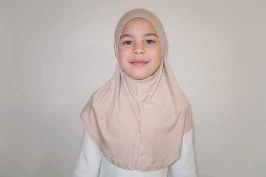girl wearing jersey hijab in beige
